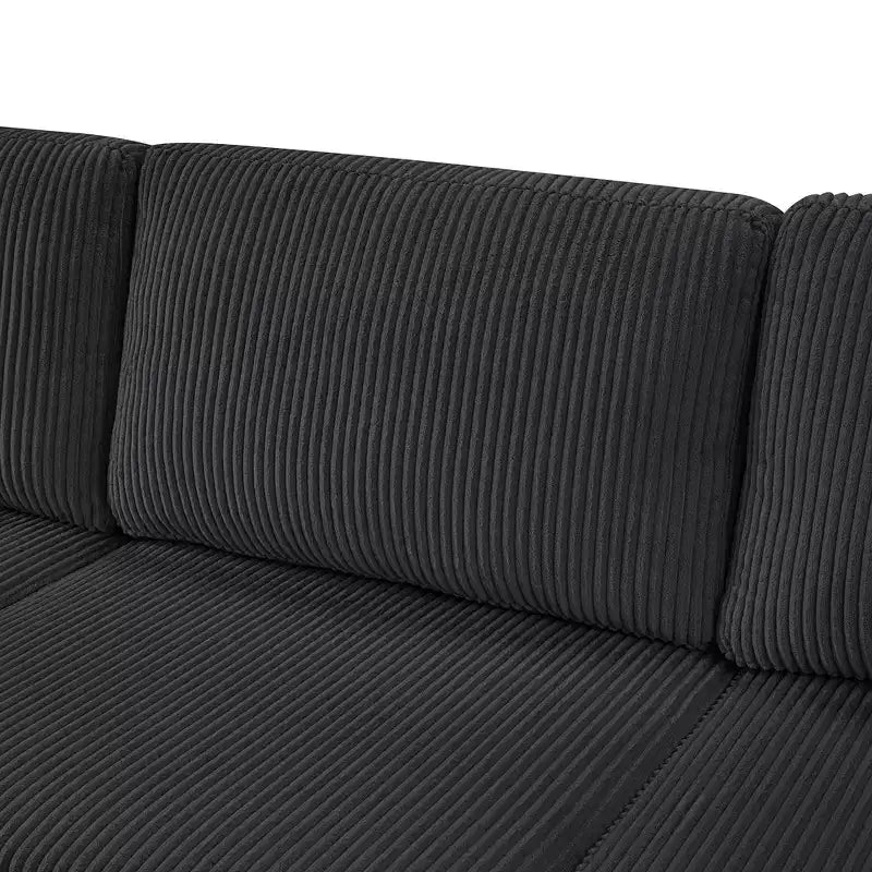 Divano componibile oversize in velluto a coste con chaise longue e tre morbidi cuscini decorativi