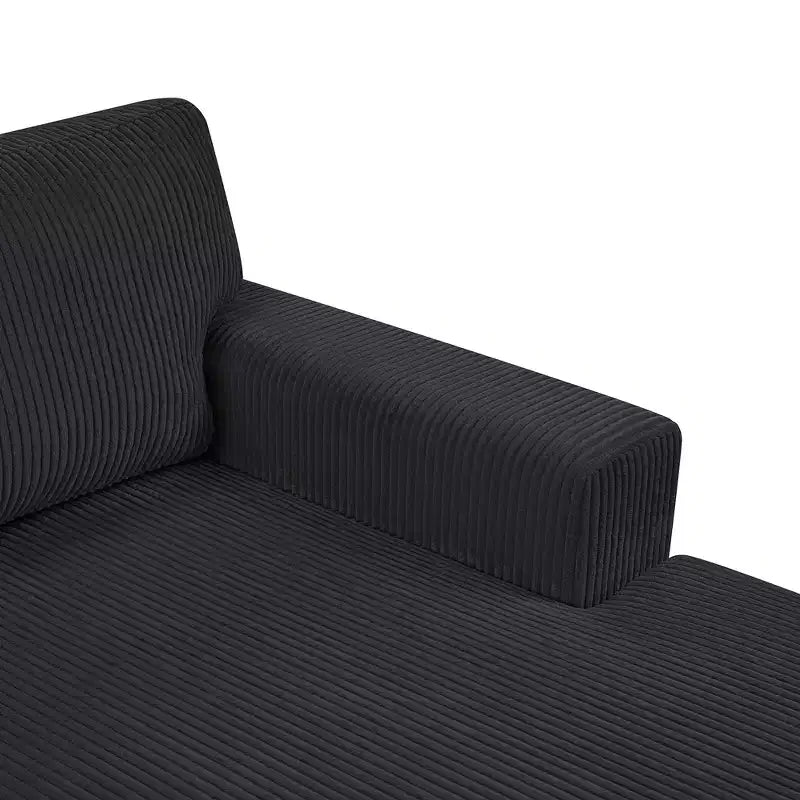 Divano componibile oversize in velluto a coste con chaise longue e tre morbidi cuscini decorativi
