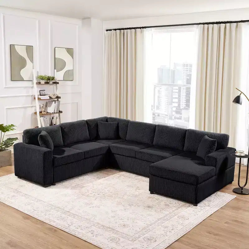 Divano componibile oversize in velluto a coste con chaise longue e tre morbidi cuscini decorativi