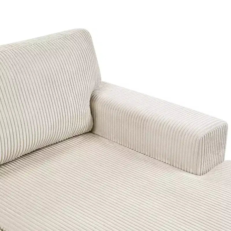 Divano componibile oversize in velluto a coste con chaise longue e tre morbidi cuscini decorativi